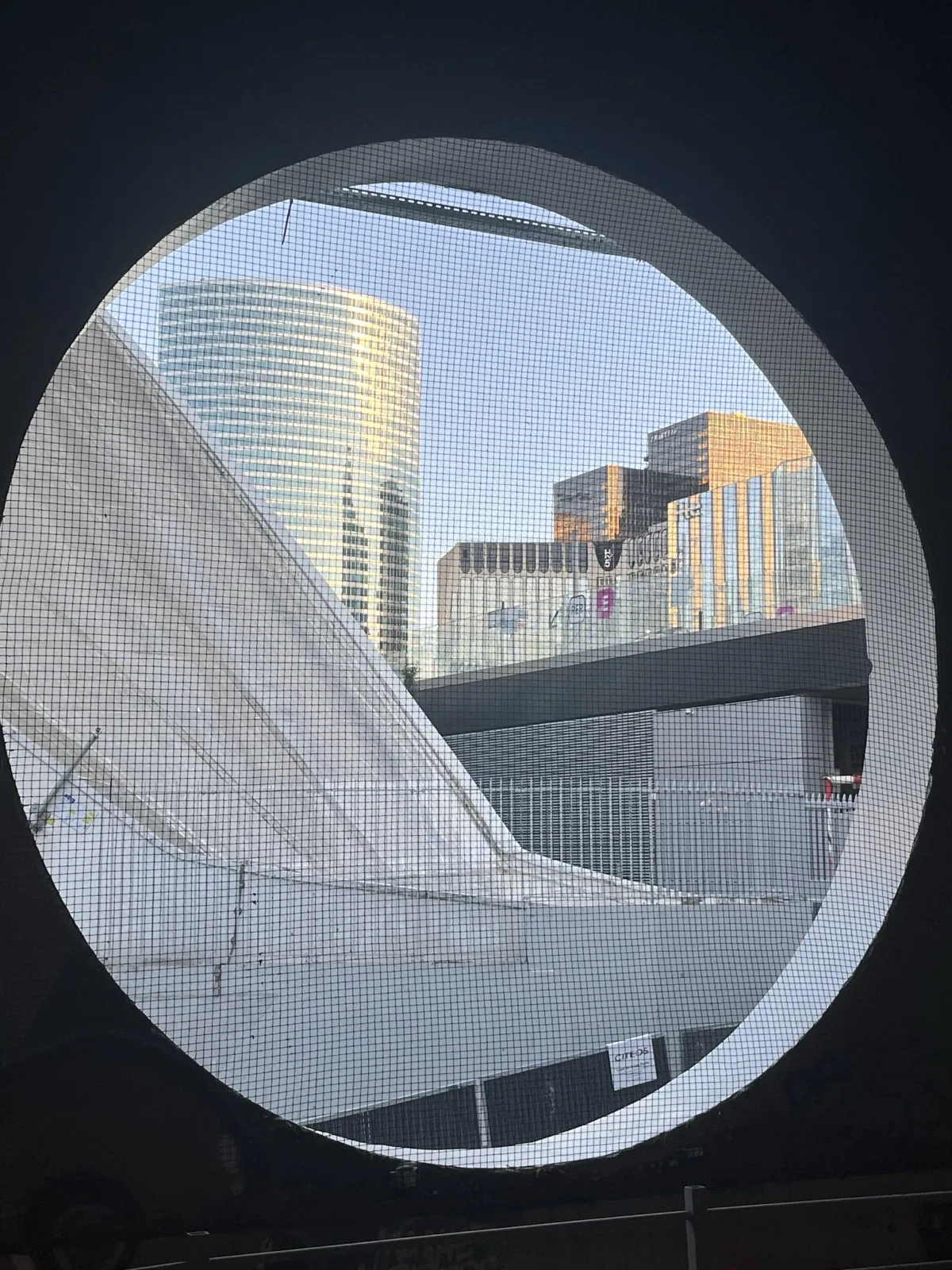 View through a circle opening at Station La Defense, Paris