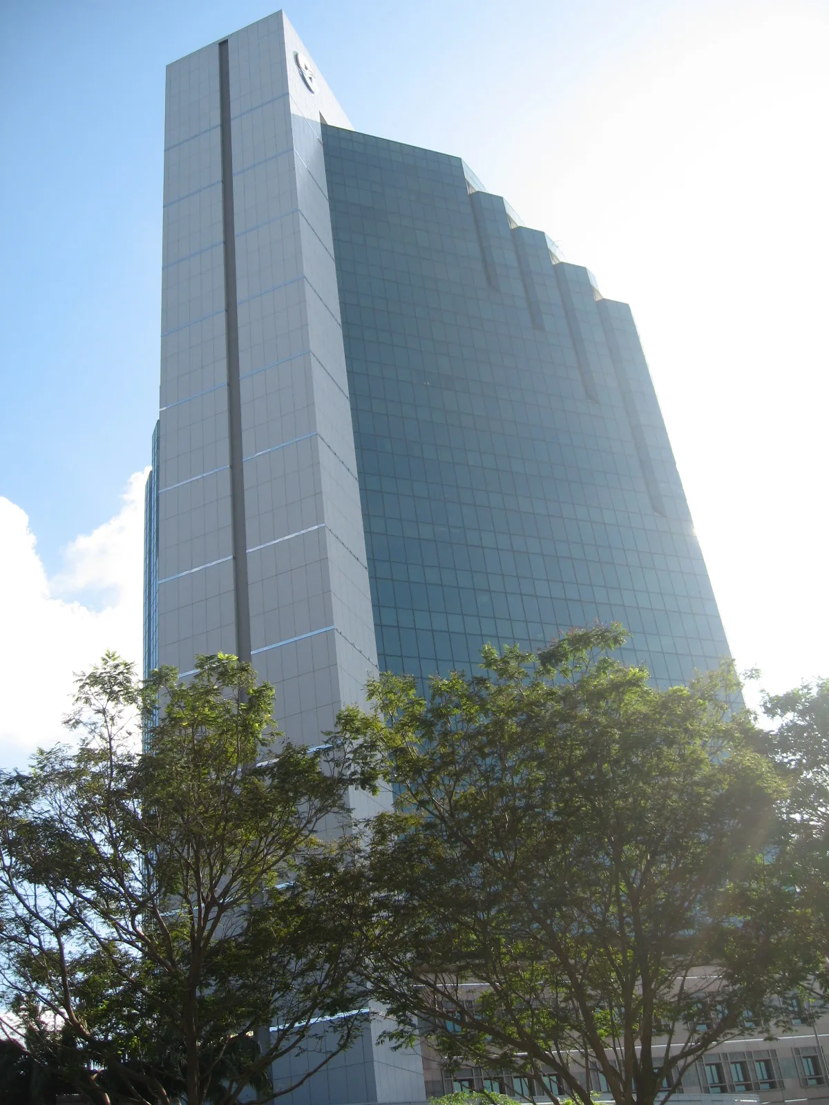 Conceptual illustration of a large corporate bond certificate being divided into smaller trading lots on a Singapore Exchange board