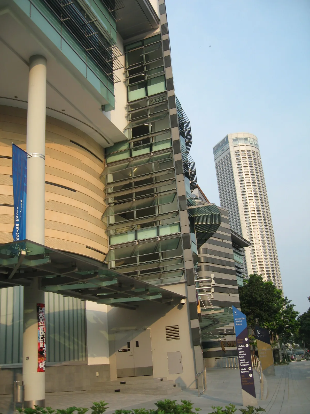 A secure vault door standing beside a stylised securities trading screen, illustrating investor compensation safeguards in Singapore's capital markets.
