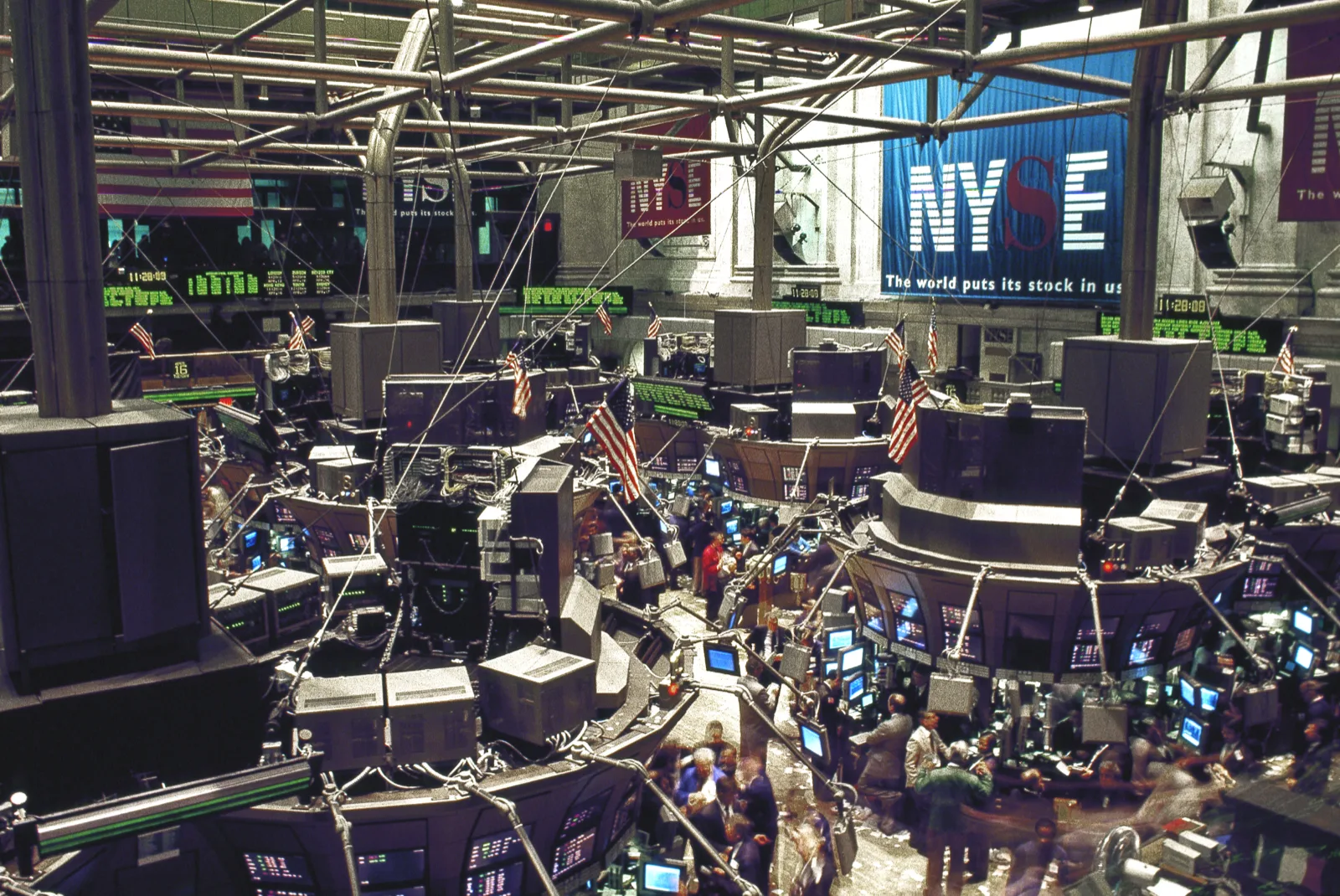 A trading floor screen displaying stock option price charts and volatility indicators